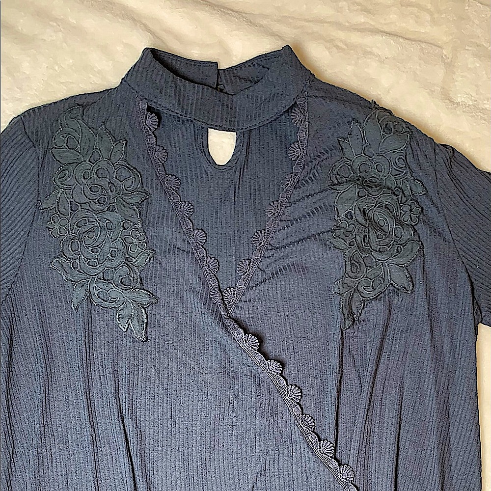 Teal cut out blouse with floral design embedded